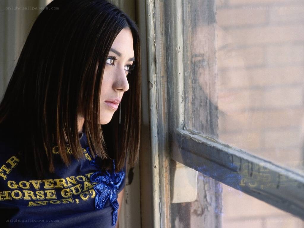 woman looking out window
