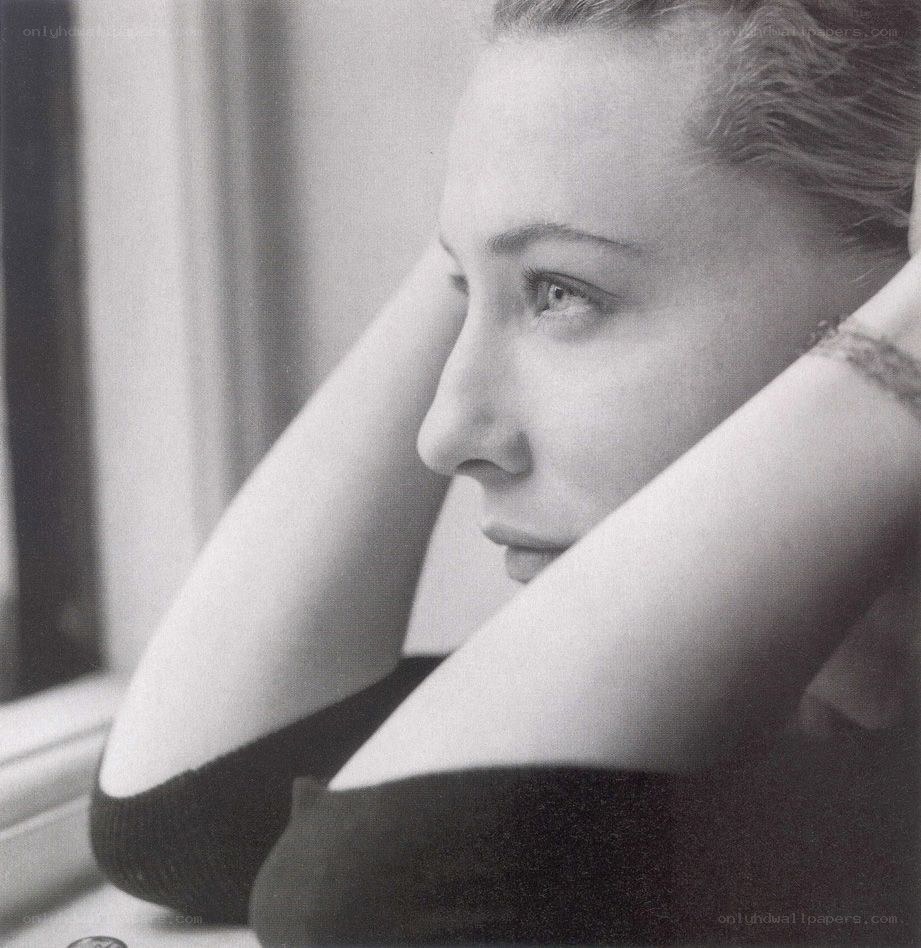 woman looking out window