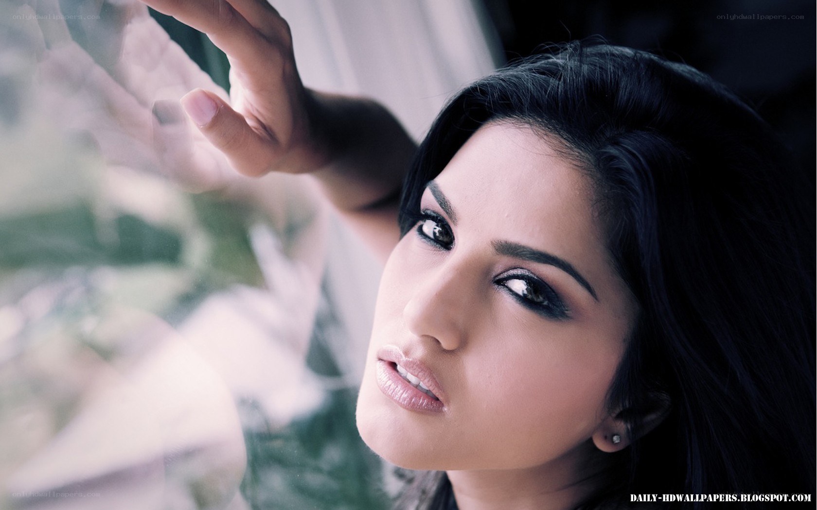 woman looking out window