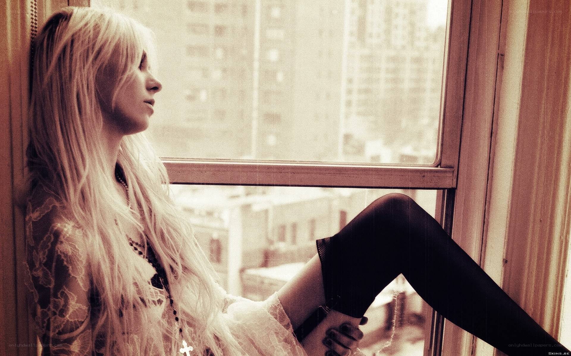 woman looking out window