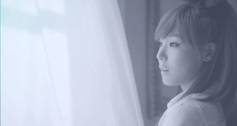 woman looking out window
