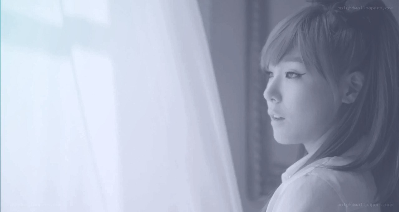 woman looking out window