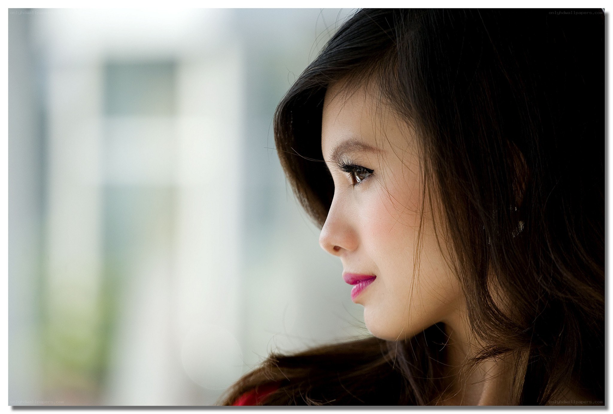 woman looking out window