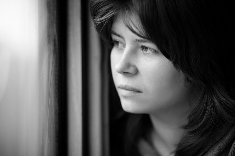 Woman Looking Out Window — Black, Contemplative, Photograph