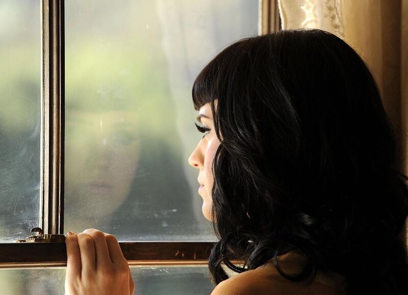 Woman Looking Out Window — Black