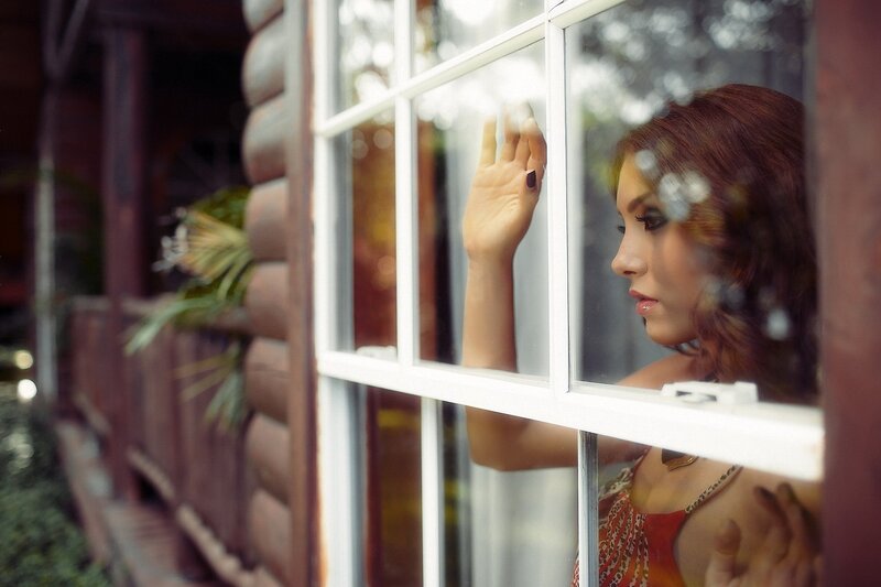 Woman Looking Out Window — Brown, Contemplative, Afternoon, Photograph, Hand