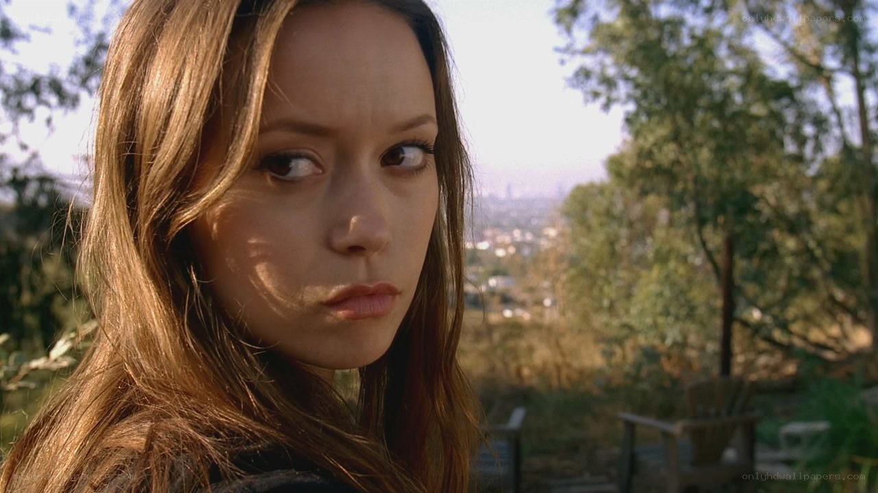 woman looking over shoulder