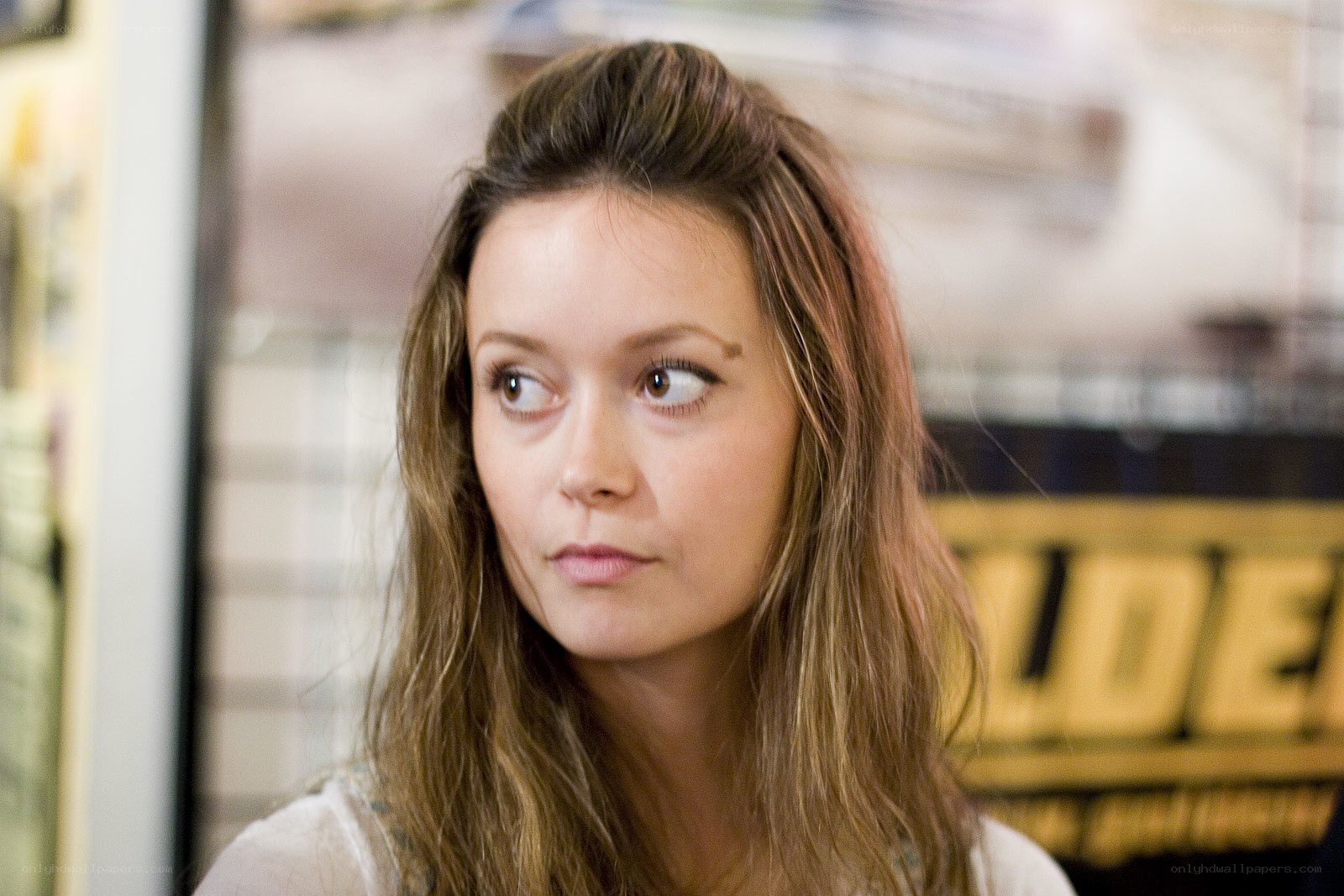 woman looking sideways in store