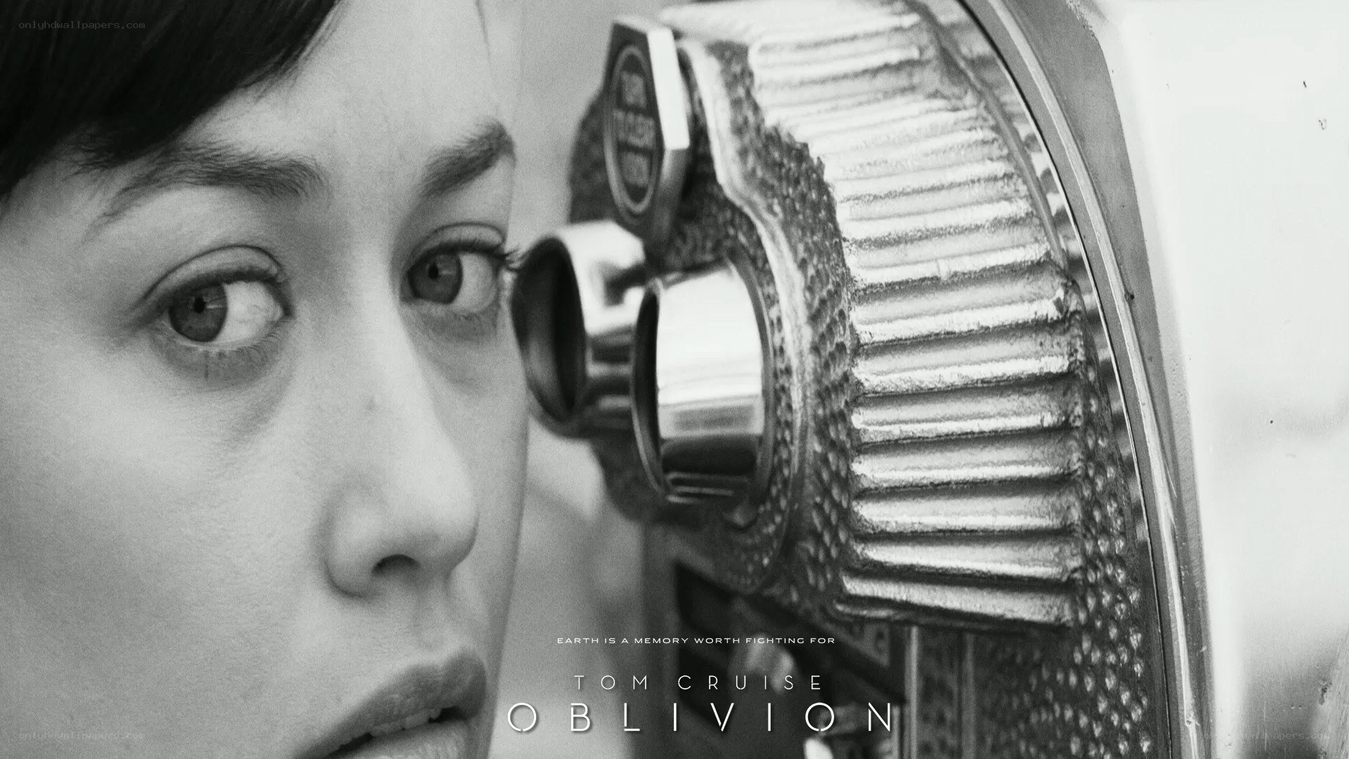 woman looking through camera