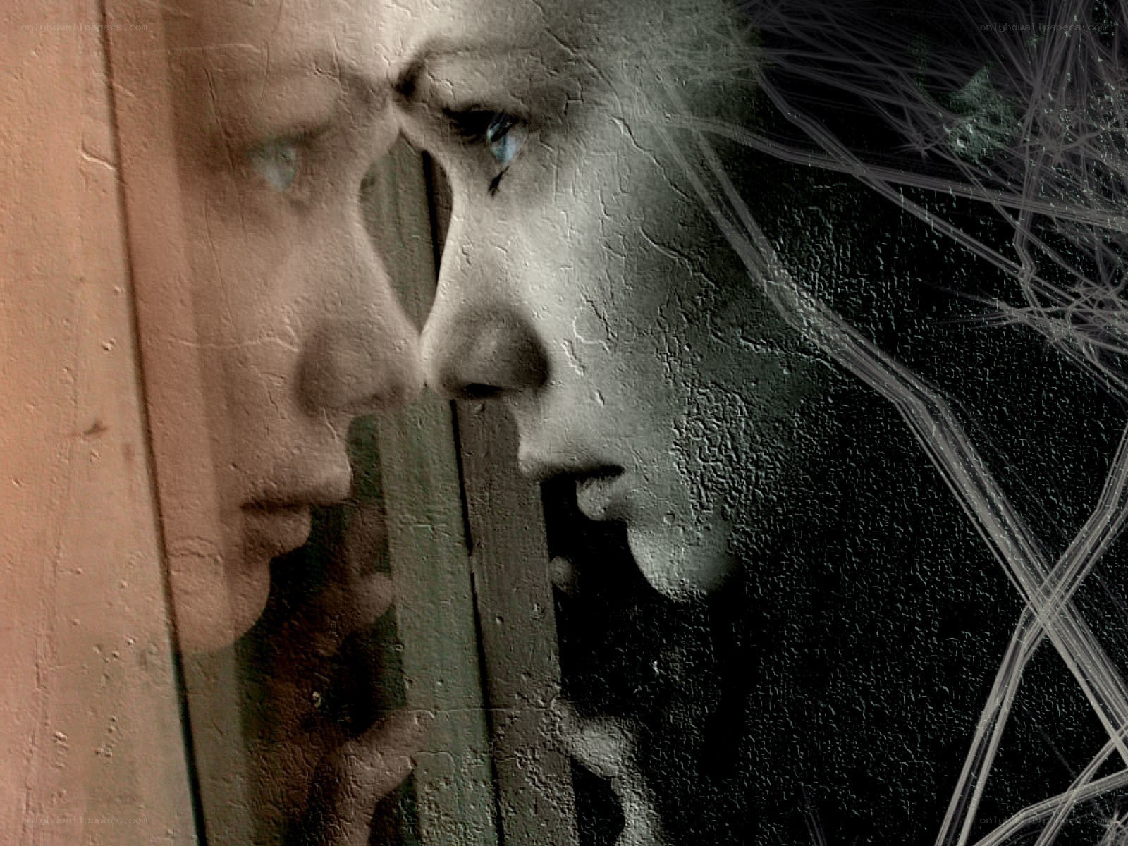 woman looking through cracked glass