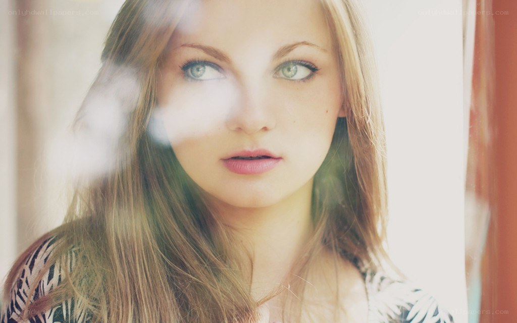 woman looking through glass