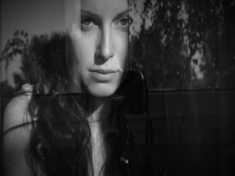 Woman Looking Through Glass — Black