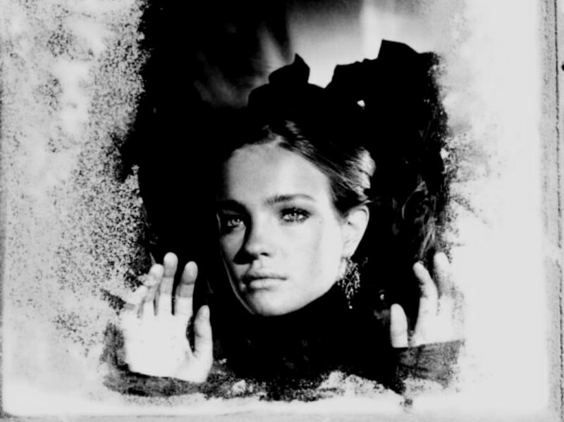 Woman Looking Through Window — Black, Dramatic, Photograph