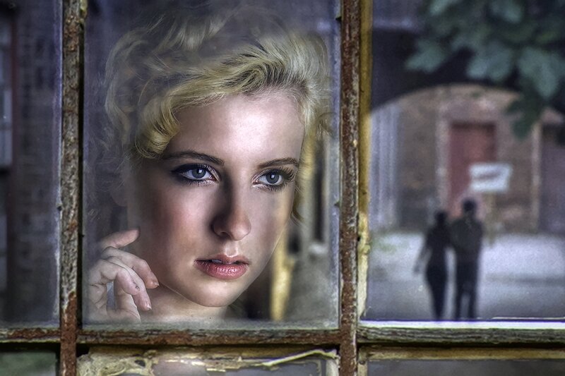 Woman Looking Through Window — Blue, Dramatic