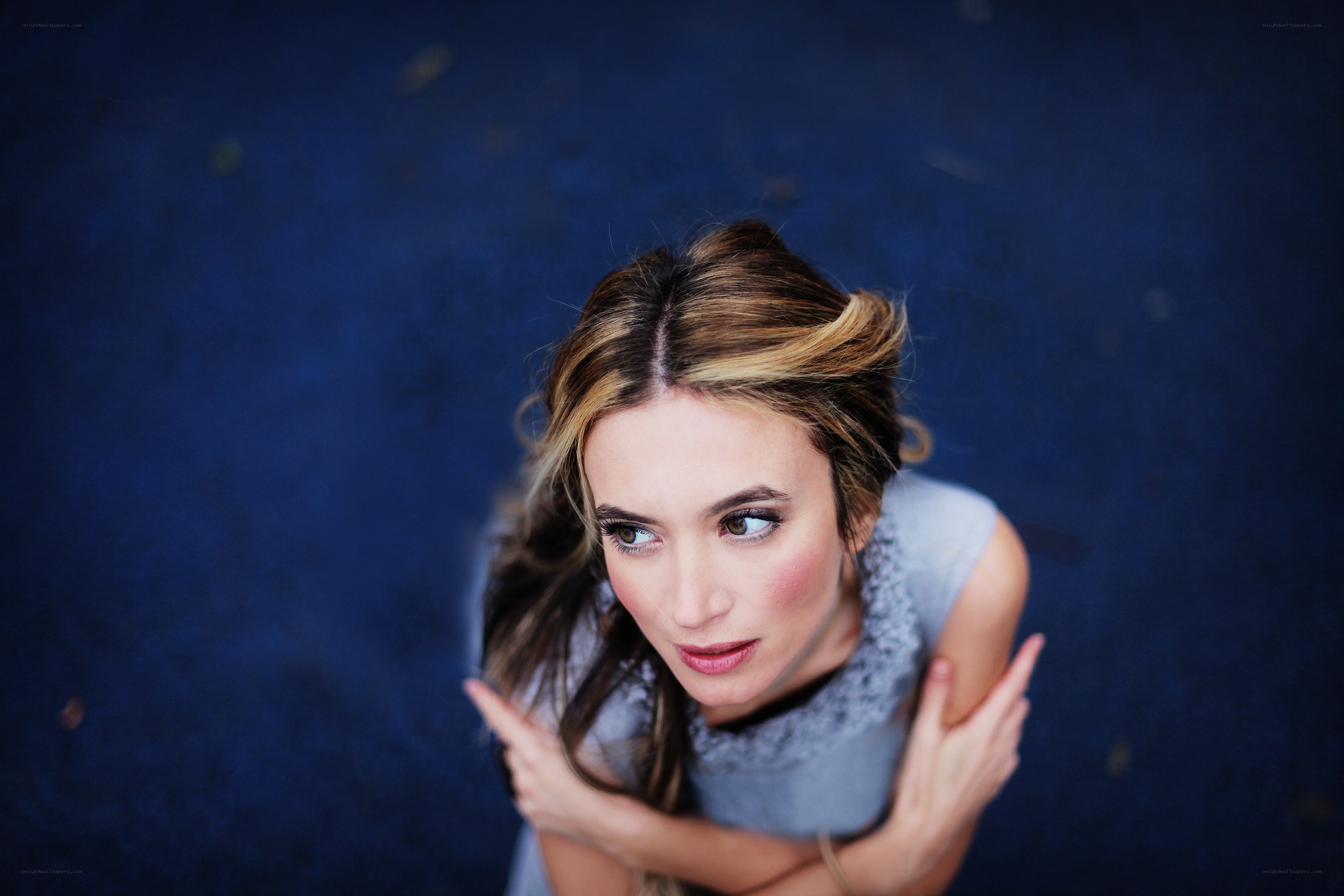 woman looking up at camera