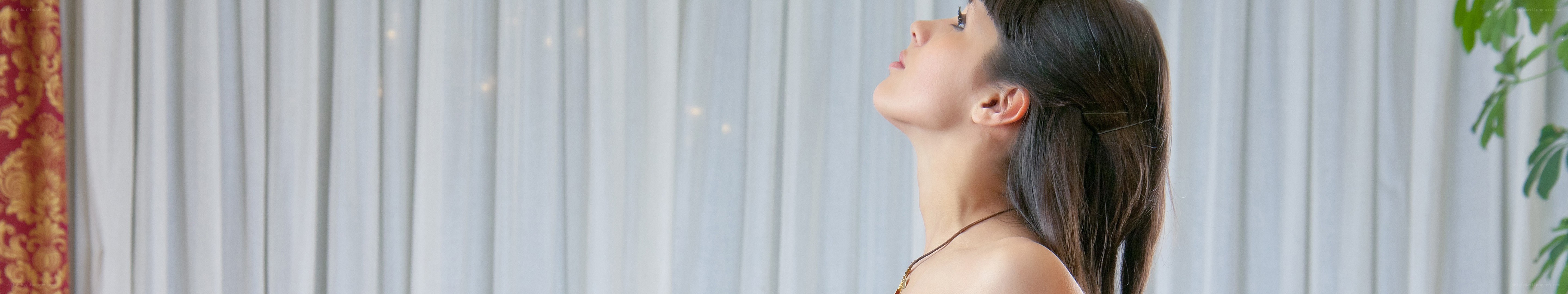 woman looking up at ceiling