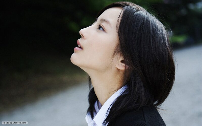 woman looking up at sky