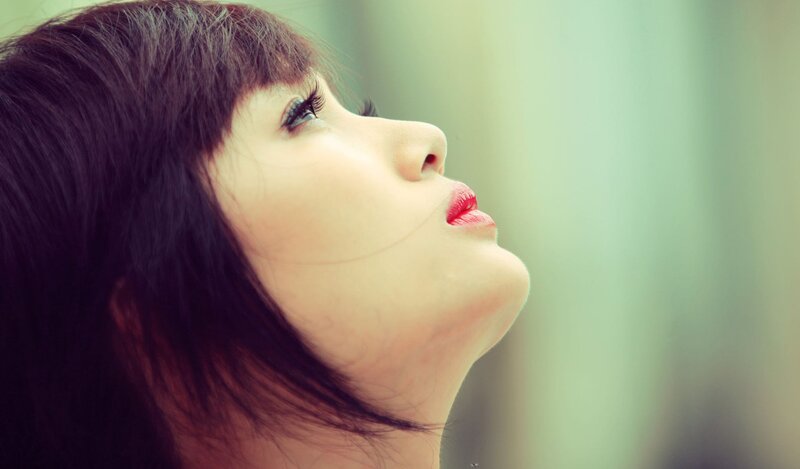 woman looking up at sky