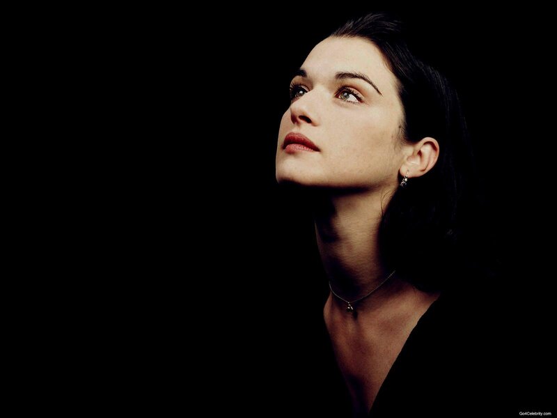woman looking up in darkness