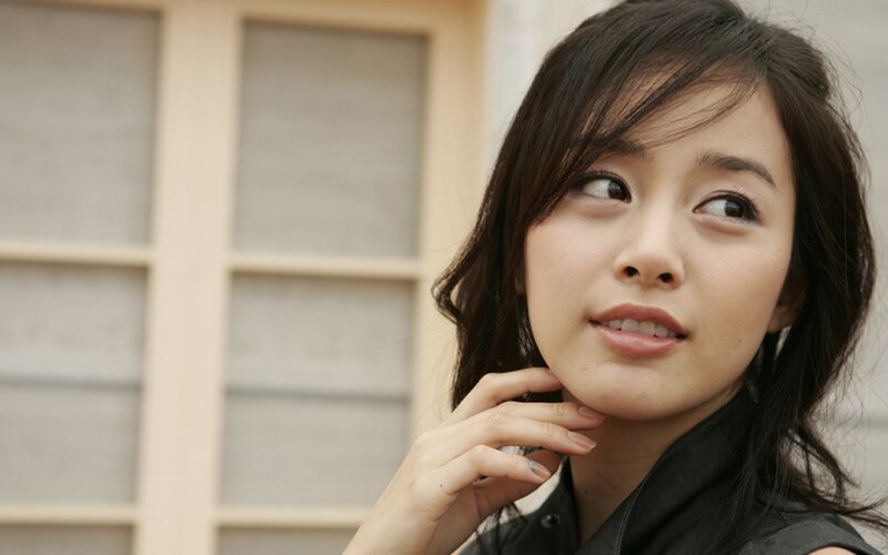 woman looking up thoughtfully