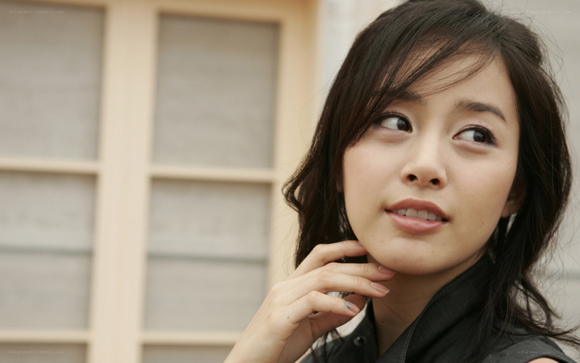 woman looking up thoughtfully
