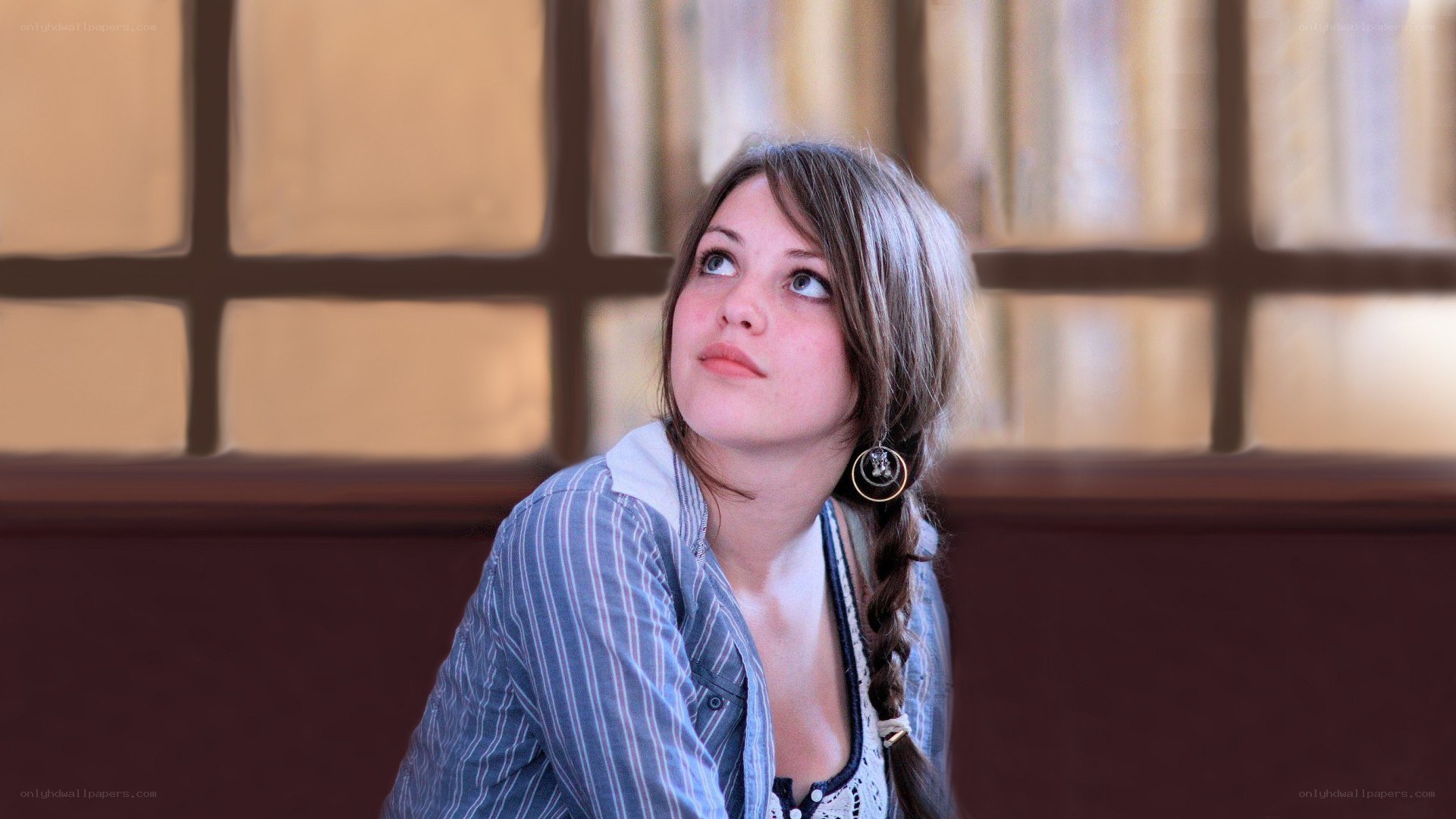 woman looking up thoughtfully