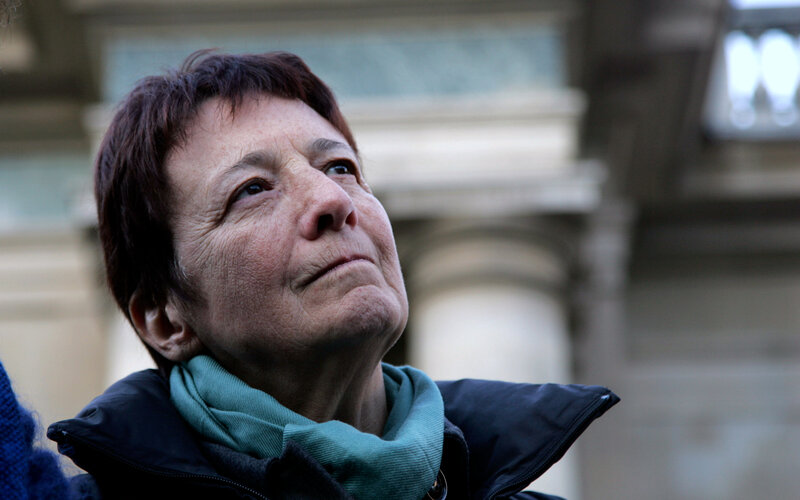 woman looking up thoughtfully