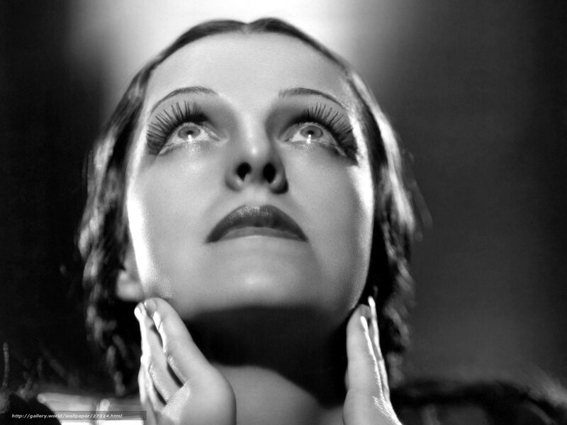 woman looking upward in black and white