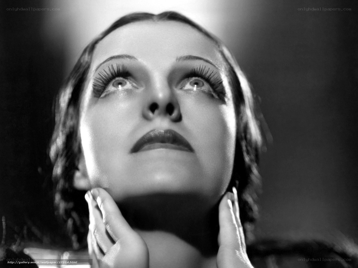 woman looking upward in black and white