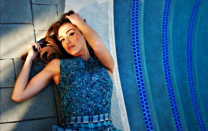 Woman Lying by Pool — Blue