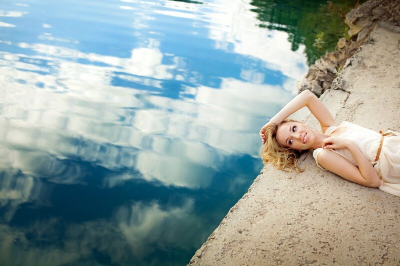 Woman Lying by Water