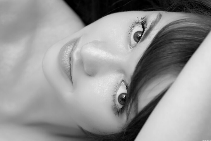 Woman Lying Down — Black, Calm, Photograph, Eyes, Hair