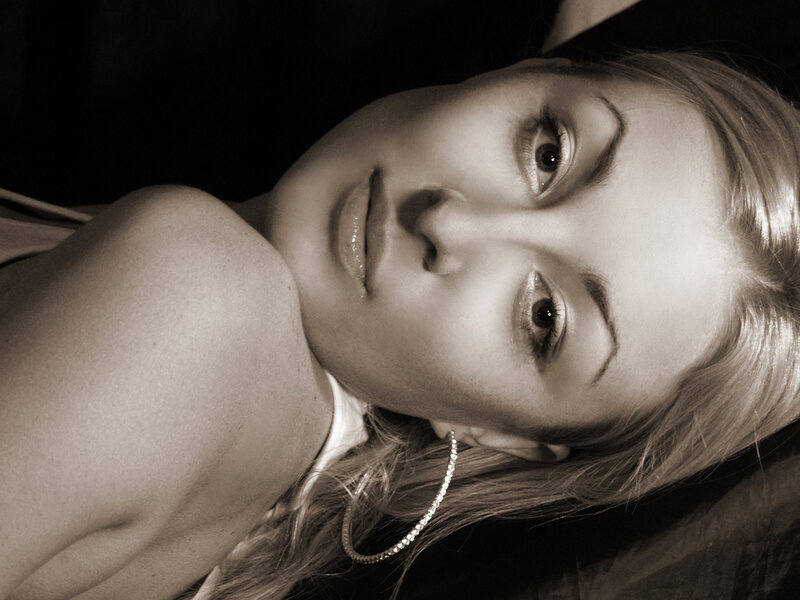 Woman Lying Down — Black, Dramatic, Photograph, Earring