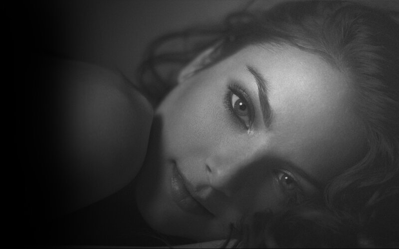 Woman Lying Down — Black, Dramatic, Photograph, Face, Hair, White