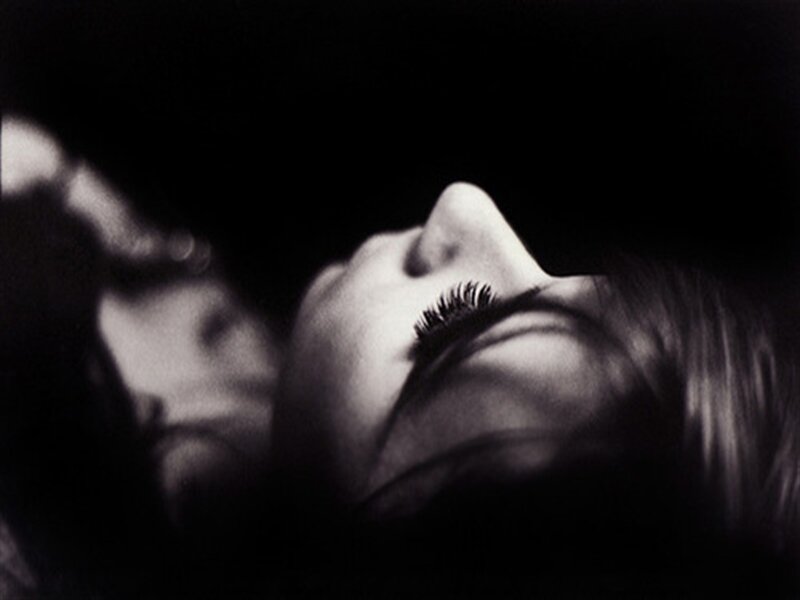 Woman Lying Down — Black, Dramatic, Photograph, Face