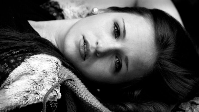 Woman Lying Down — Black, Dramatic, Photograph, Fur Collar