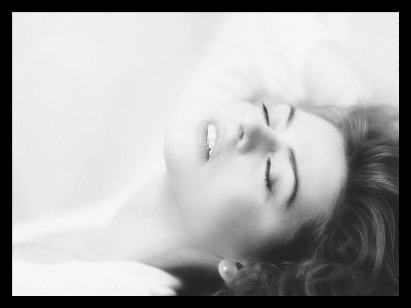 Woman Lying Down — Black, Serene, Photograph