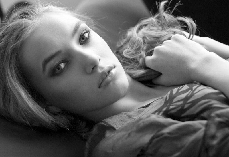 woman lying down in black and white