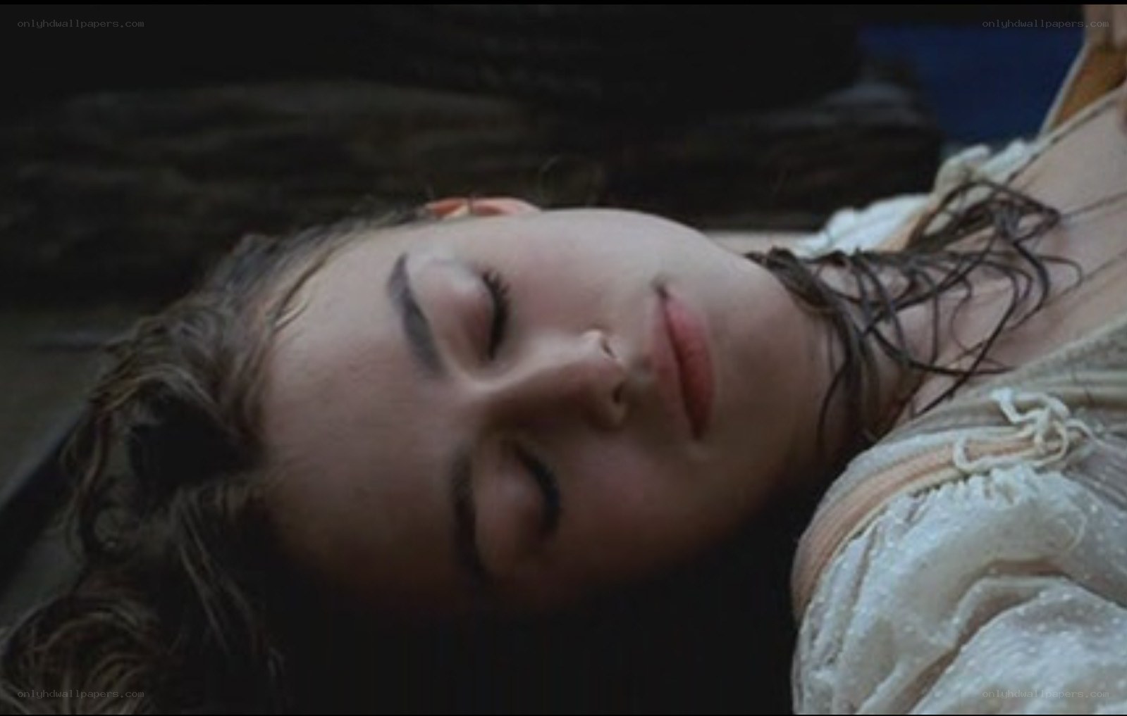 woman lying down with eyes closed