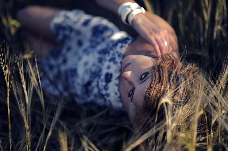 woman lying in a field