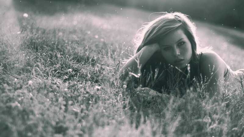 woman lying in a field
