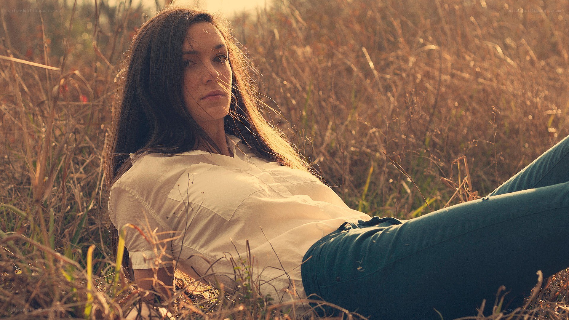 woman lying in a field