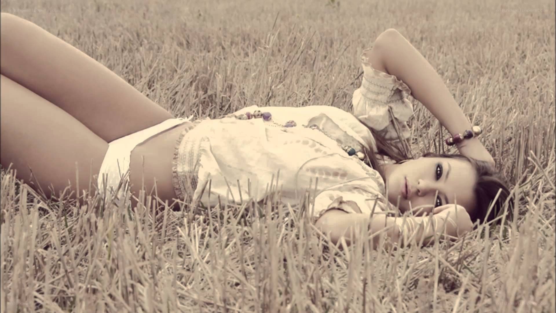 woman lying in a field