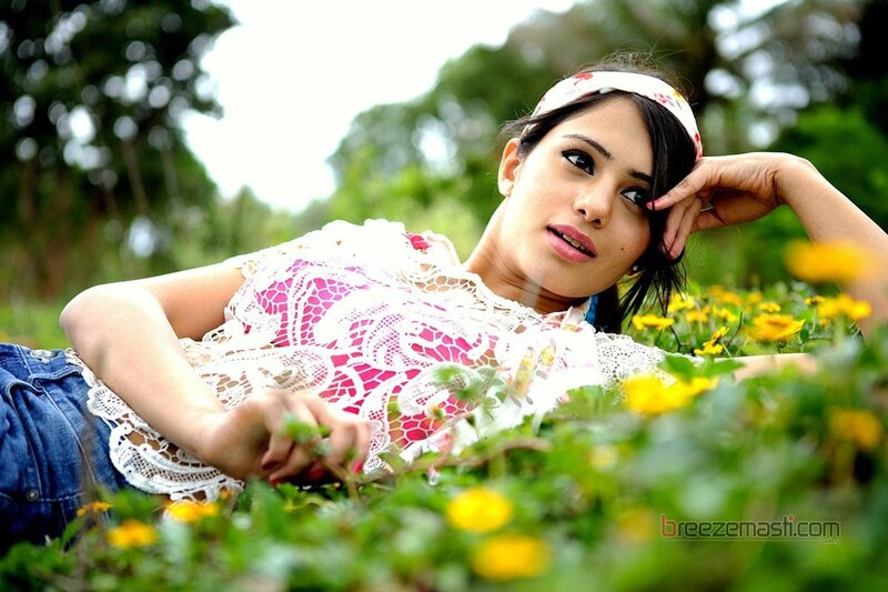 woman lying in a field of flowers
