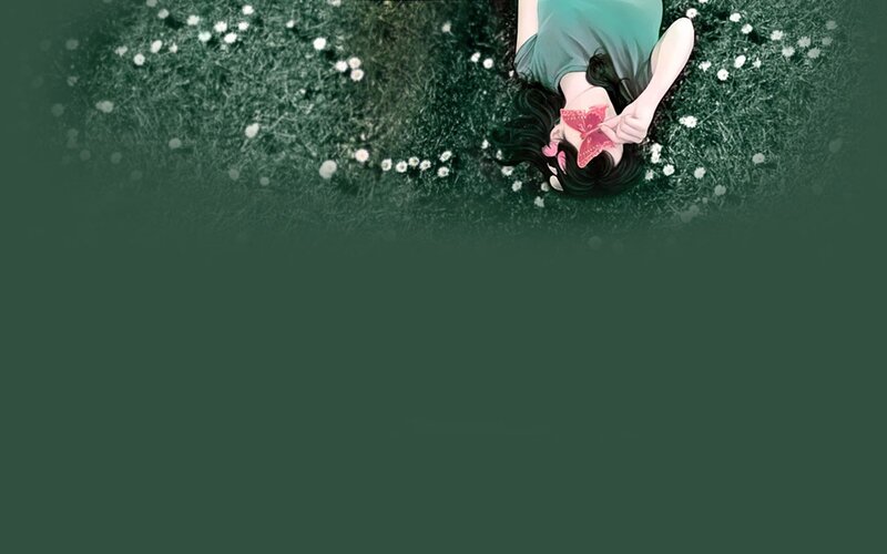 woman lying in a field of flowers