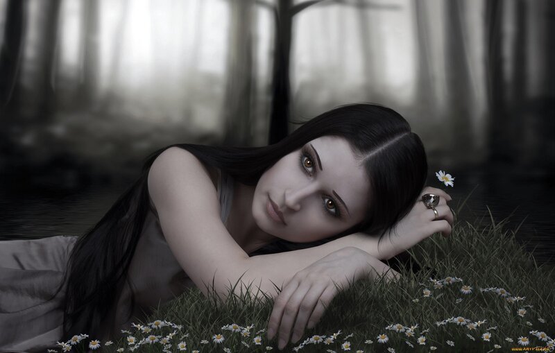 woman lying in a forest