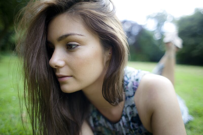 woman lying in a park