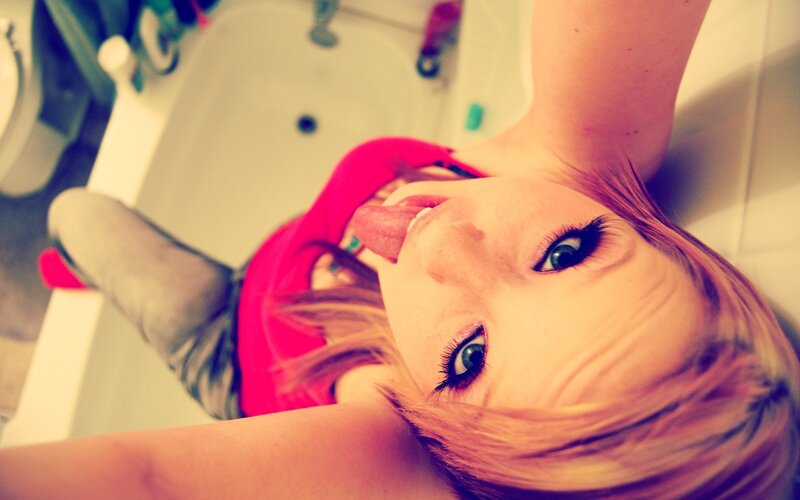 woman lying in bathtub