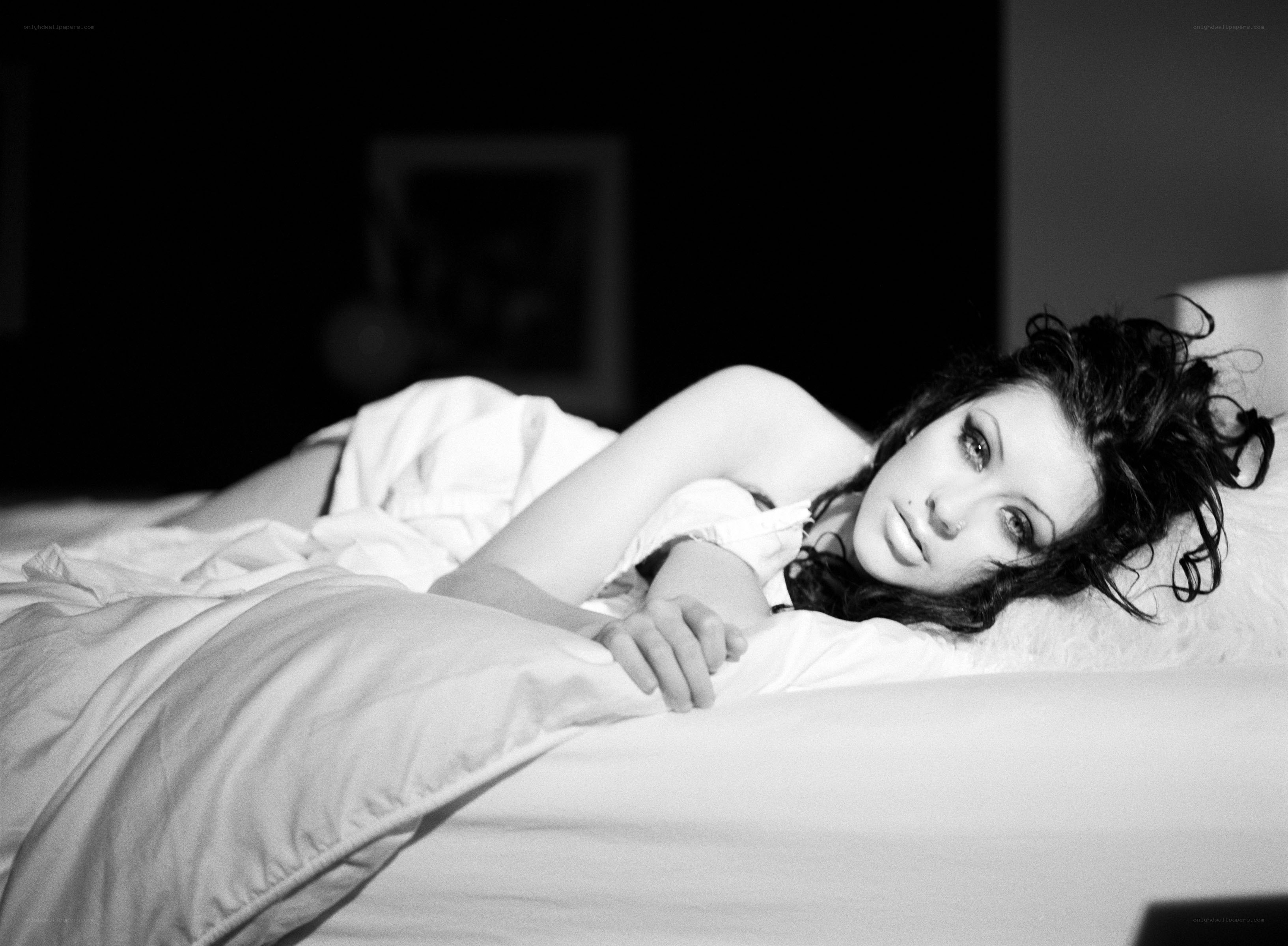 woman lying in bed