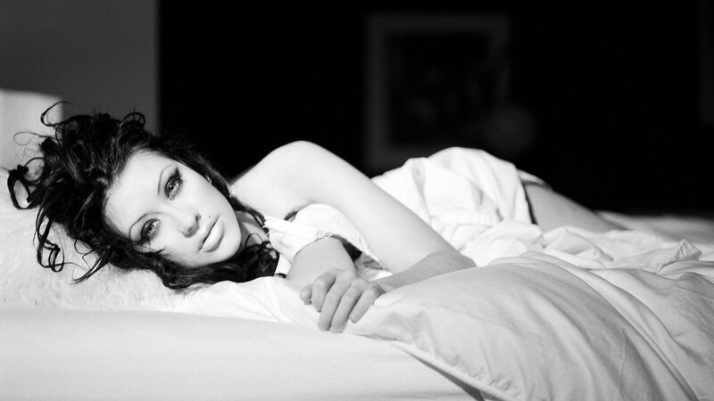 woman lying in bed